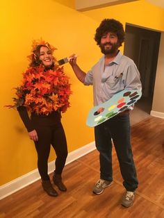 a man and woman dressed up in costumes