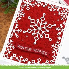 a card with snowflakes on it and the words winter wishes written in white