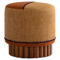 a stool made out of bamboo sticks with a brown and blue stripe on the top