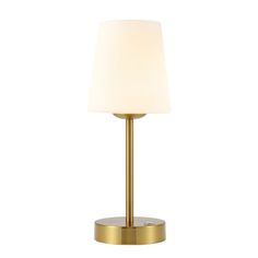 a gold table lamp with a white shade on the base and a round light fixture