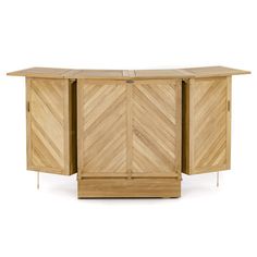 the sideboard is made out of wood and has two doors, one with an open door