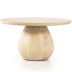 a wooden table with a circular top and base on the bottom, in front of a white background