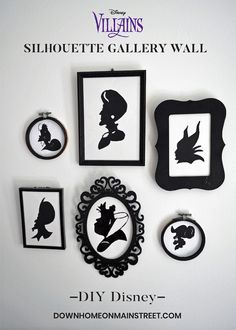 the silhouettes of disney characters are hung on the wall above them is an ornate frame