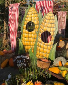 corn on the cob decorations are displayed for sale