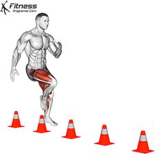 an image of a man that is running through traffic cones