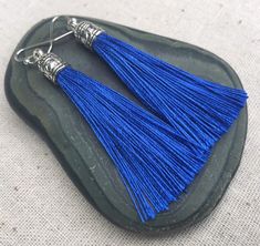 "Chic royal blue tassel earrings! They would add a pop of color to any outfit for any occasion. Dress them up or down. They are timeless and versatile. They are lightweight, fun and unique! The tassels measure 2 1/8\" long by 1/4\" wide. They hang from simple silver ear wire hooks. Overall drop length is about 2 1/4\". Metal is allergy free plated silver. These are my latest creation! I have them available in many colors! Find them all under the category tassel earrings in my shop. Thanks for st Blue Fringe Drop Earrings, Blue Fringe Tassel Drop Earrings, Blue Fringe Earrings As Gift, Blue Fringe Earrings For Gift, Blue Tassel Drop Earrings For Gift, Blue Dangle Tassel Earrings As Gift, Blue Dangle Tassel Earrings For Gift, Royal Blue Jewelry, Peace Sign Jewelry