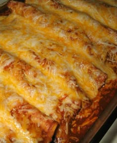 a casserole dish with meat and cheese on it, ready to be eaten