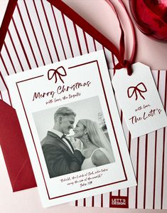 two christmas cards on top of each other with a red ribbon around the neck and an image of a man and woman