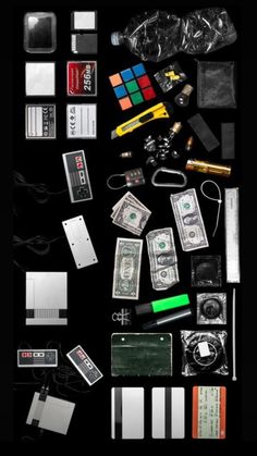 the contents of an electronic device laid out on top of each other in black and white