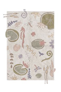 a white rug with various designs on it