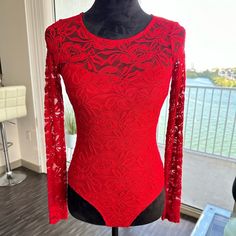 Sexy Red Long Sleeve Lace Bodysuit, With Open Back. Fitted Red Bodysuit For Club, Red Stretch Bodysuit For Party, Red Long Sleeve Bodysuit For Night Out, Red Stretch Bodysuit For Night Out, Red Long Sleeve Bodysuit For Party, Red Long Sleeve Party Bodysuit, Red Fitted One-piece Bodysuit, Fitted Red Bodysuit For Night Out, Red Fitted Bodysuit For Night Out