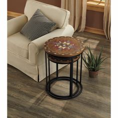 a living room scene with focus on the flooring and table in the foreground