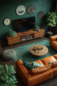 a living room with green walls and leather furniture