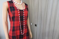 Red and black plaid pinafore dress, size S, 36. Hand-sewn dress. A timeless one. She slips on. Round collar. Sleeveless. Wear with a blouse or long-sleeved t-shirt. No composition label: probably cotton mixed with wool Shoulder to shoulder: 35 cm Armpits: 47 cm Size: 41cm Length: 88 cm The necklaces in the photos are not included but they are for sale in the store. Net weight: 244 gr. Scottish Dress, Pinafore Dress, Red And Black Plaid, Black Plaid, Dress Clothes For Women, Round Collar, Red And Black, Hand Sewn, Tartan