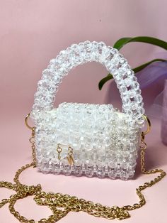 Mini Crystal bag, handmade. There is also a pouch for storing your handbag. Length 5 in Width 3 in Height 3 in(with handle 6 in) Trendy Handheld Box Bag Gift, Top Handle Bag As Gift, Pearl Handle Tote Bag For Gift, Gift Tote Bag With Pearl Handle, Rectangular Shoulder Bag With Top Carry Handle As Gift, Rectangular Shoulder Bag With Top Carry Handle, Top Handle Box Bag With Detachable Handle, Square Box Bag With Top Carry Handle For Gift, Square Bags With Top Carry Handle For Gifts