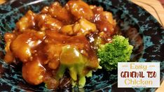 chicken and broccoli on a blue plate with the words easy general tso chicken