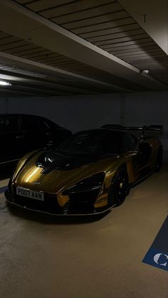 two sports cars parked in a parking garage