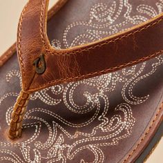 A well-crafted sandal made with full-grain leather and embroidery inspired by Hawaiian paniolo (cowgirl) culture. Translation: Hawiian Cowgirl (pah-ee-oh-loh) In 1833, Mexican vaqueros taught Hawaiians how to manage cattle. Since then, the paniolo (cowgirl) culture has thrived in Hawai‘i. Our Paniolo sandal taps into that aesthetic and sense of adventure with its saddle-inspired stitching and deeply oiled leather. They’re perfect for around-town and out-of-town wear. Made for the beach, not the Animal Shoes, Cooler Lunch Bag, Wedge Flip Flops, Nautical Jewelry, Beach Flip Flops, Leather Flip Flops, Meaningful Jewelry, Handbag Straps, Religious Jewelry