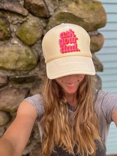 Introducing the "Go Ask Your Dad Trucker Hat" - a trendy and playful addition to our Mama Trucker Hat Collection. This beige unisex sized trucker hat is designed with the modern mom in mind, blending style, comfort, and a touch of humor. Adorned with bold pink text that playfully reads "Go Ask Your Dad," it's the perfect way to add a bit of fun to your daily wear or make a statement at your next gathering. Crafted for women who appreciate a blend of fashion and functionality, this trendy trucker Playful Adjustable Cream Hat, Cute Flat Brim Hat One Size, Cute Adjustable Baseball Cap With Short Brim, Cute Beach Hats With Letter Print, Funny White Adjustable Baseball Cap, Cute Letter Print Hats For The Beach, Cream Snapback Hat One Size, Casual Cream Flat Brim Trucker Hat, Cream Curved Brim Trucker Hat For Beach