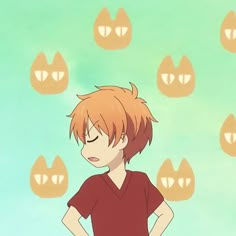 an anime character is standing in front of many orange cats on the wall behind him