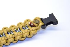 a close up of a paracording cord on a white background with clippings