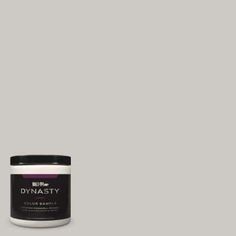 a can of dymasty paint on a gray background