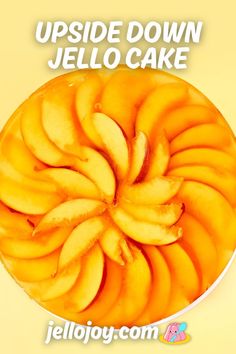 upside down jello cake with sliced mangoes on top and the words upside down jello cake above it