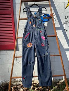 "Vintage Bespoke One of a kind Sears stitched embroidered patched Bib Overalls denim jeans Measurements: Medium Waist 32\" Inseam 29\" Fabric: Cotton Cute, lovely and adorable Levi's - stitched, patched, lace.... wear with flip flops or cowboy boots - wear a tank top or a peasant blouse... you could not be cuter! These are previously owned jeans before stitching.  NO RETURNS.  Thank you for visiting Tripp's Store.  Peace. Love. Understanding." Decorated Overalls, Upcycle Overalls, Overall With Patches, Iron On Patch Overalls, Vintage Patchwork Overalls, Vintage Cotton Patchwork Overalls, Patchwork Overalls Hippie, Retro Patch, Y2k Boho