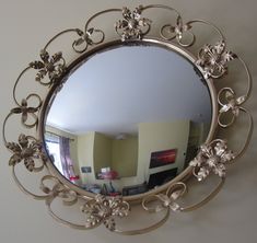 a mirror that is hanging on the wall