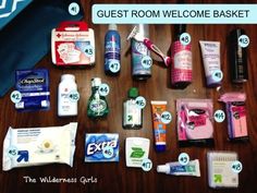 the contents of a guest room welcome basket laid out on a wooden table with instructions