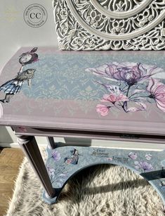 a bench with flowers painted on it