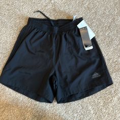 5” Running Shorts With Side Pockets Adidas Gym Bottoms With Built-in Shorts, Spring Adidas Moisture-wicking Bottoms, Adidas Black Athletic Shorts With Built-in Shorts, Adidas Moisture-wicking Shorts, Adidas Bottoms For Gym In Spring, Adidas Gym Bottoms For Spring, Adidas Casual Shorts For Training, Adidas Casual Training Shorts, Spring Adidas Gym Bottoms