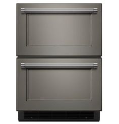 two double ovens side by side on a white background