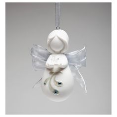 an ornament shaped like a baby's pacifier hanging from a chain