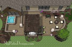 an aerial view of a house with a pool in the center and patio furniture on the other side