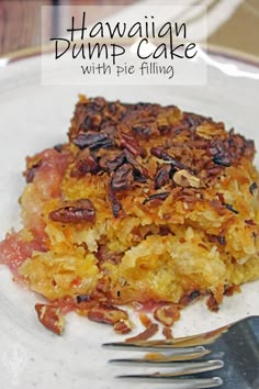 a close up of a plate of food on a table with a fork and knife