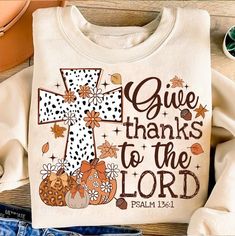 a t - shirt with the words give thanks to the lord and pumpkins on it