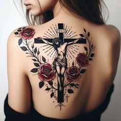 a woman with a cross and roses tattoo on her back