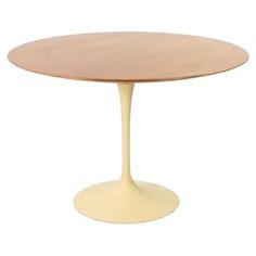 an oval table with a wooden top on a white background, it is made from plywood