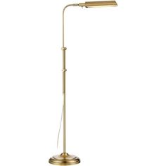 a gold floor lamp with a white background