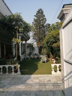 the back yard is clean and ready to be used as an outdoor space for relaxing