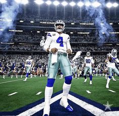 a football player standing on top of a field