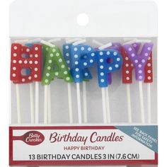 happy birthday candles with polka dots on them in a carded package for $ 3 99