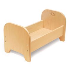 a wooden toddler bed sitting on top of a white floor