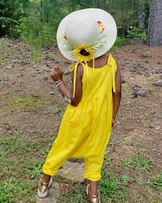 This handmade, custom designed straw hat is perfect for this Spring/Summer. Now that Stay at Home orders are lifted, they are just waiting for beach strolls and dinner parties. Features: 22.5", 3" Brim that narrows in the back Natural Straw Faux SunFlower & Stems Yellow Ribbon Ethnic Beading Note: Model is 5 years old (21" head circumference). Sunflower Hat, Yellow Ribbon, Dinner Parties, Head Circumference, Stay At Home, Wide Brimmed, Straw Hat, Dinner Party, Beading