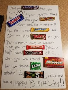 a handwritten birthday card with candy bars and chocolates on it that says happy birthday