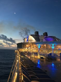 the deck of a cruise ship at night