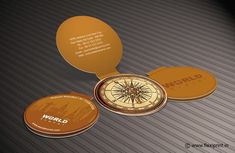 an image of a business card with a compass in the middle and world on it