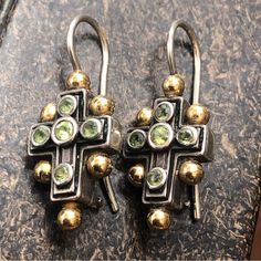 I Purchased These Beautiful Pre-Owned Earrings On Ebay Around Twelve Years Ago. They Are Sterling With 18k Accents. Stamped 925 And 750. There Are No Other Hallmarks. They Have Bezel Set Peridot Gemstones. Hook Closures. They Have An Oxidized Patina With A Little Bit Of Green On The Silver Which Happens To Sterling Sometimes. I Am Not Polishing Them As Some People Prefer The Oxidation. Measurements In Photos. Wires Slightly Out Of Shape. Konstantino Jewelry, Peridot Earrings, Peridot Gemstone, Out Of Shape, Bezel Setting, Patina, Jewelry Earrings, Women Jewelry, Gemstones