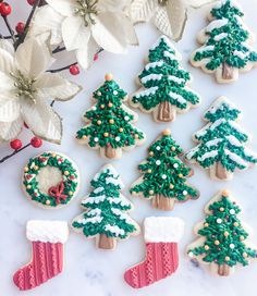 christmas cookies decorated with green and white icing